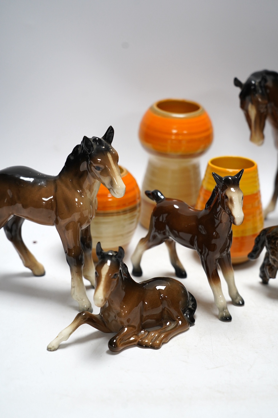 Three Shelley vases and six Beswick horses and a Canton cased teapot, teapot 14cm high. Condition - poor to fair